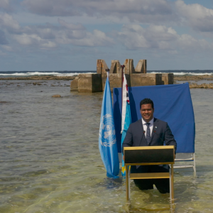 Hon. Minister Simon Kofe filming a video statement in Tuvalu on climate mobility for COP26 Tuvalu.TV 810x532
